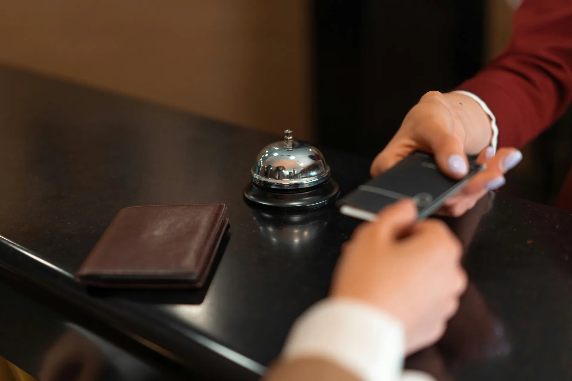 Concierge service bell at a luxury reception desk