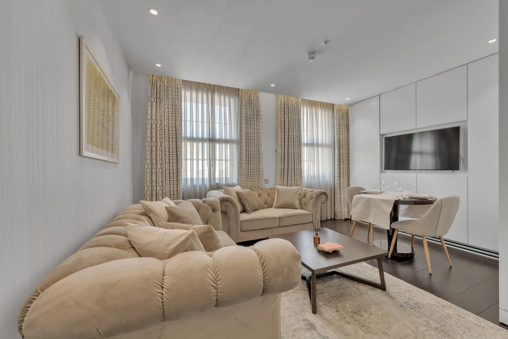 Elegant serviced apartment living room with designer furnishings in London